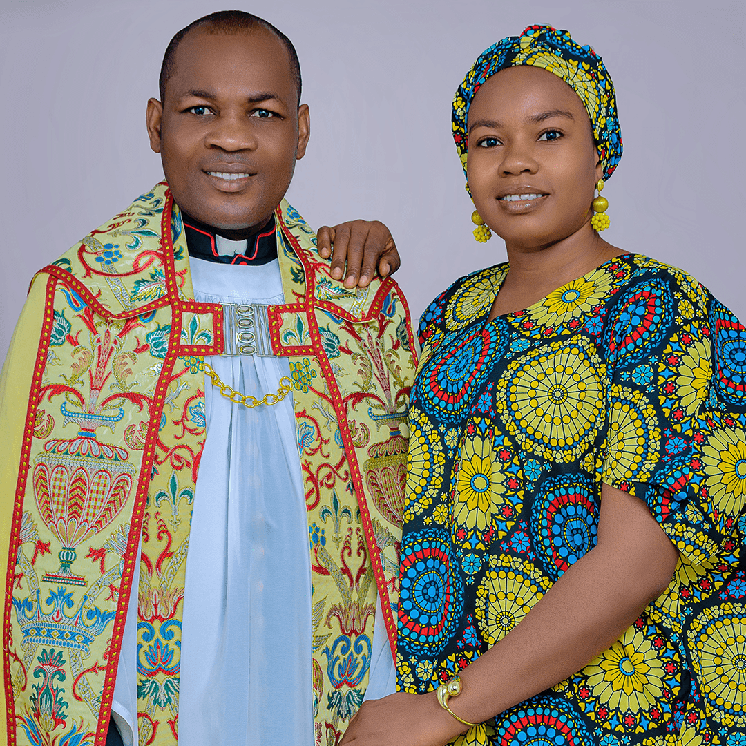 The Venerable Alex Uzor in cope and surplice beside his wife, Mrs Olivia Alex-Uzor